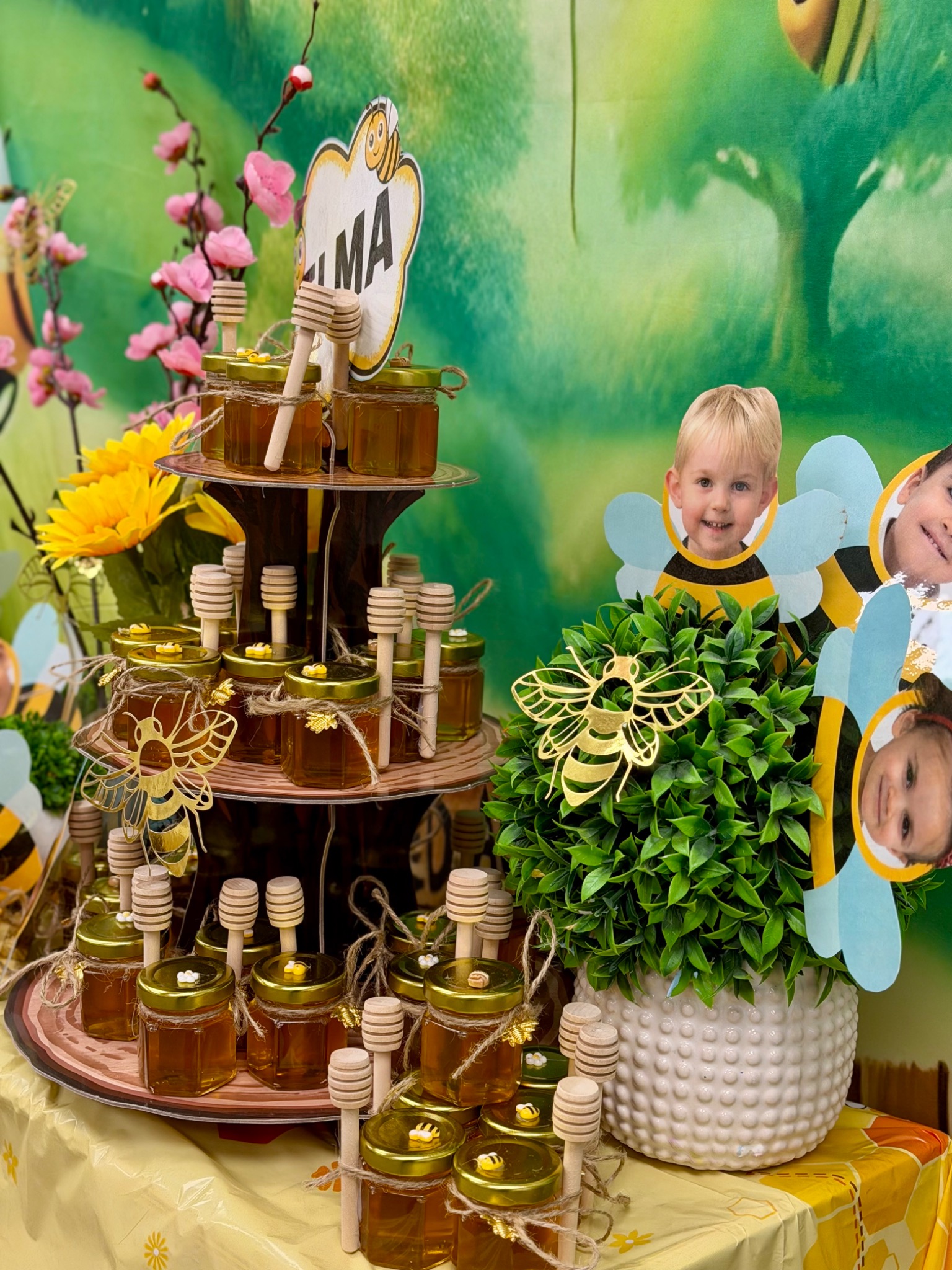 A young child exploring a nature-themed sensory display