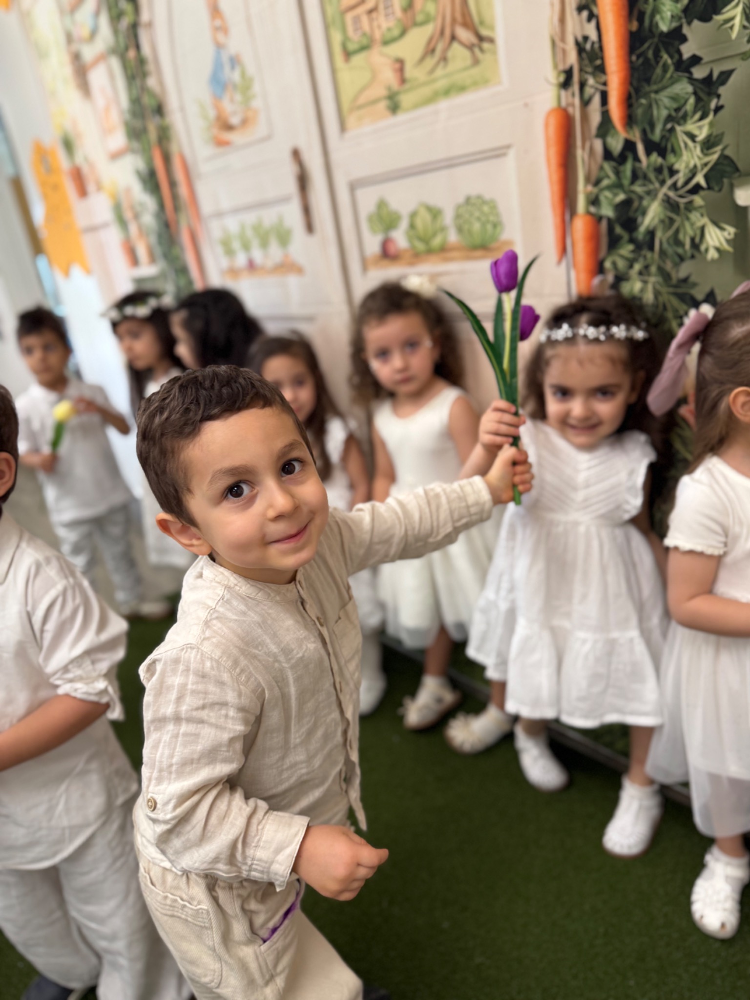 Preschool children participating together in a nature-inspired group lesson